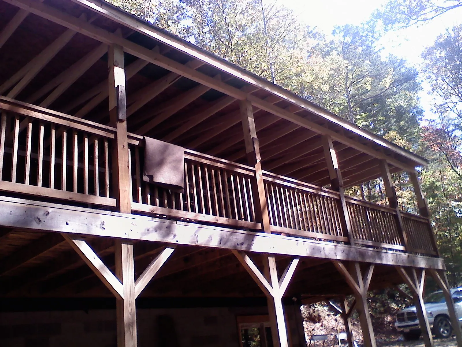 Timber framing under a new elevated porch and deck — Roof Leak Repair in Jackson by Roofing Brothers
